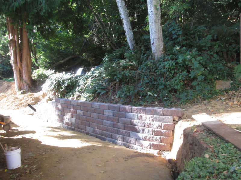 northsideofhouse_regrading-retaining-wall-project-onewallfinished_091516